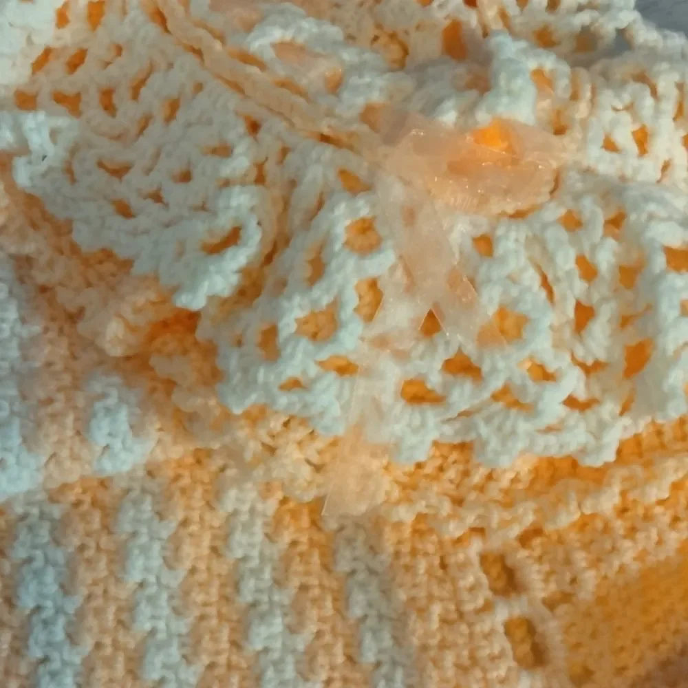 Never used.  ( my mom) homemade baby 🐥 blanket